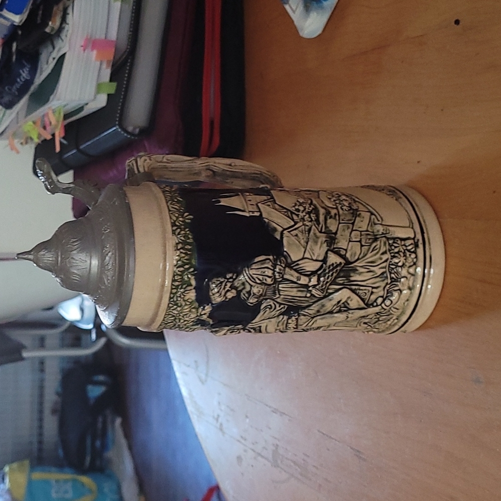 German antique beer stein